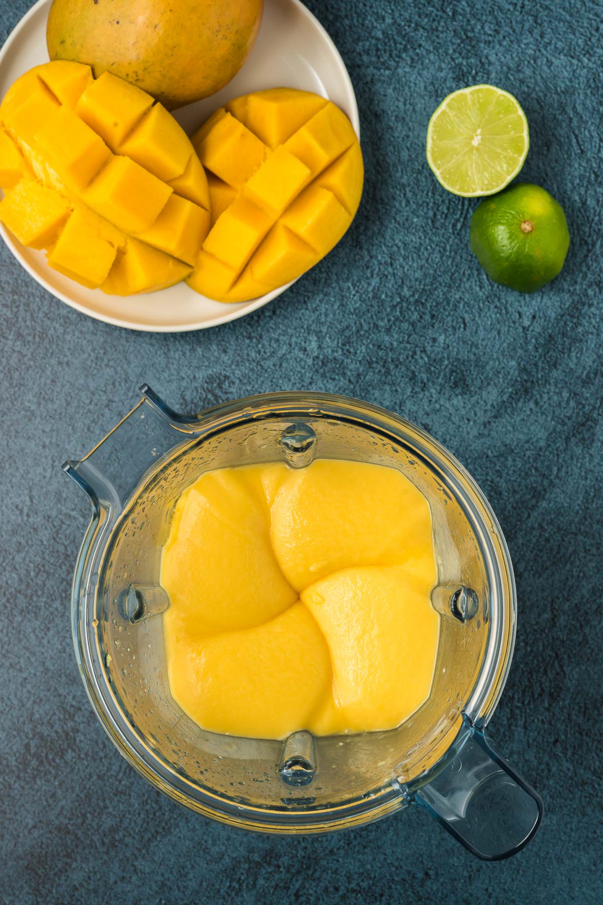 Blended mango puree in blender